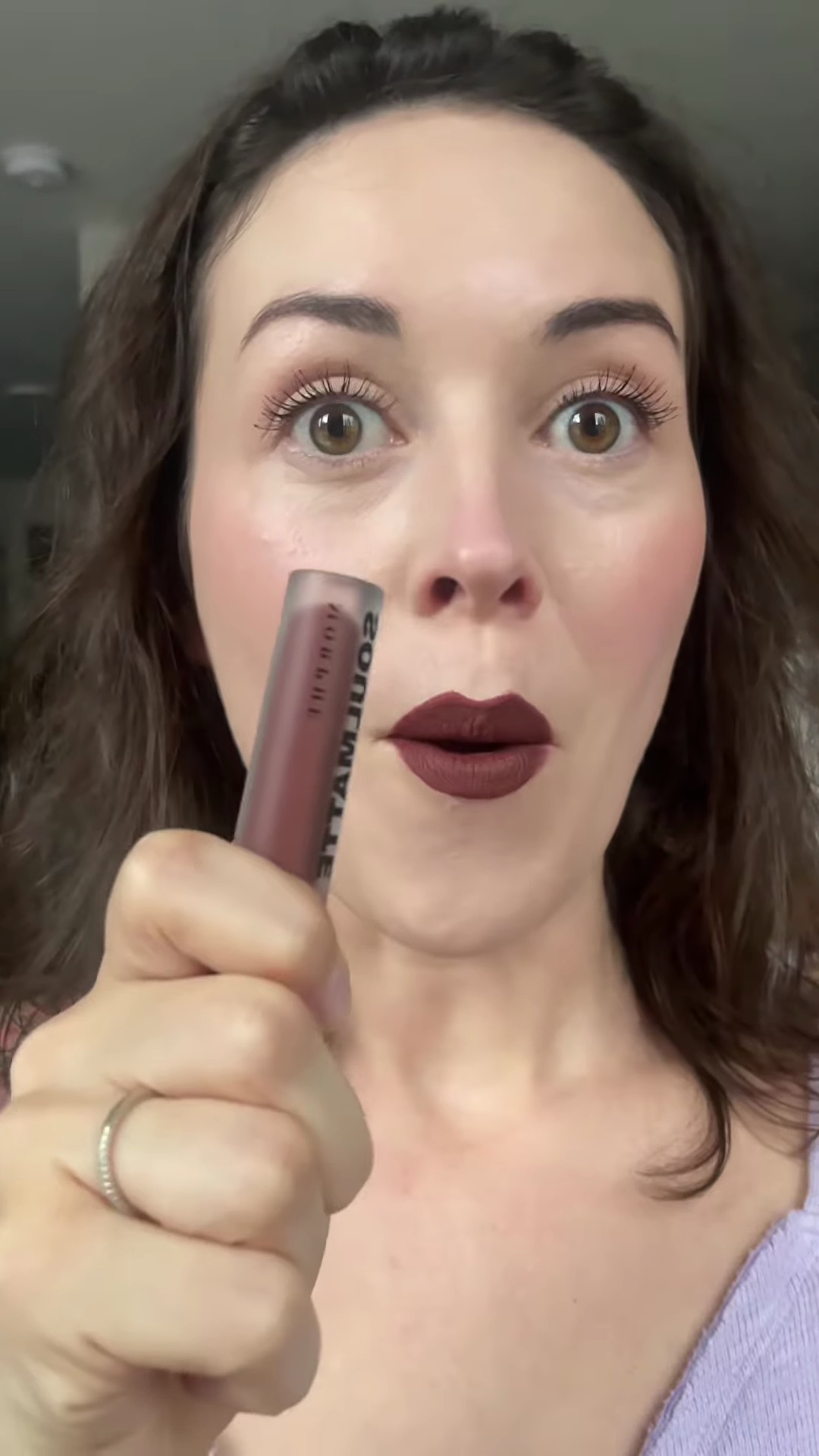 Creator looking at camera while mentioning other available shades