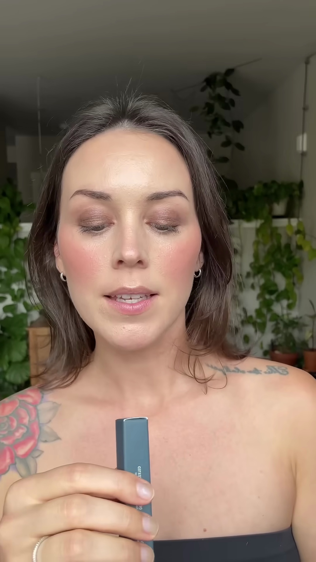 Close-up swatch of Soshe Beauty Mocha lip pencil showing warm brown color on fair olive skin