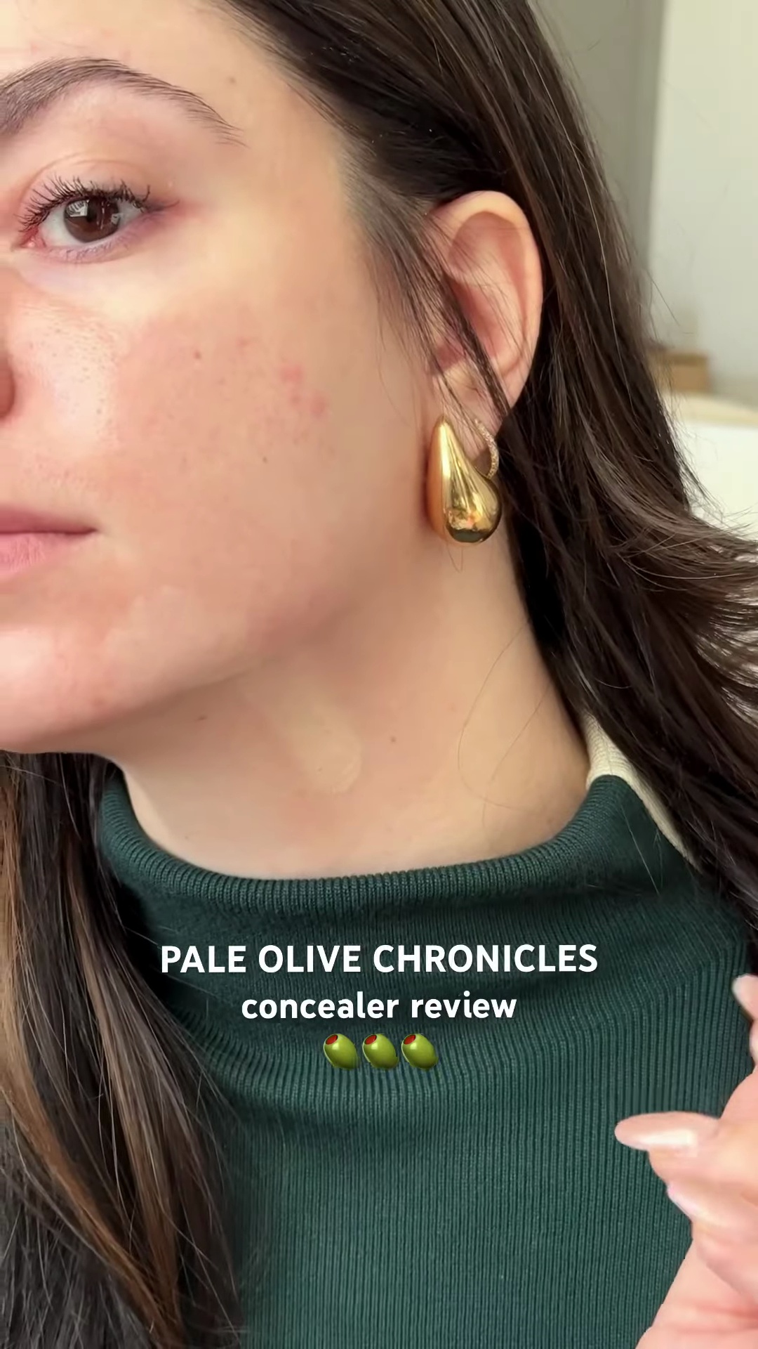 Close-up of Made By Mitchell Balm Concealer in shade BB3 being swatched on fair olive skin