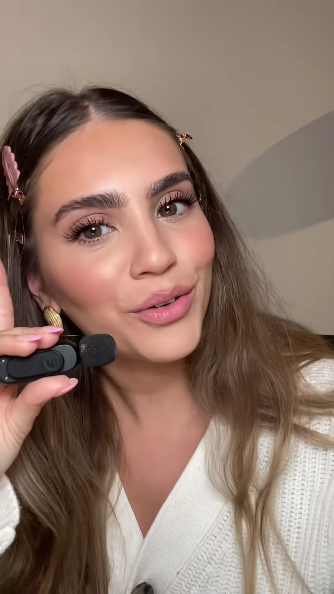 Completed makeup look with perfectly matched foundation on light olive skin