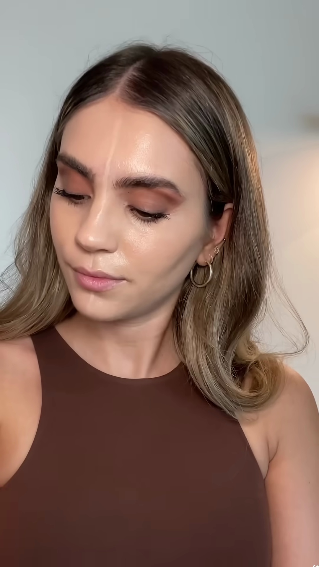 Beauty creator engaging with audience for foundation shade feedback