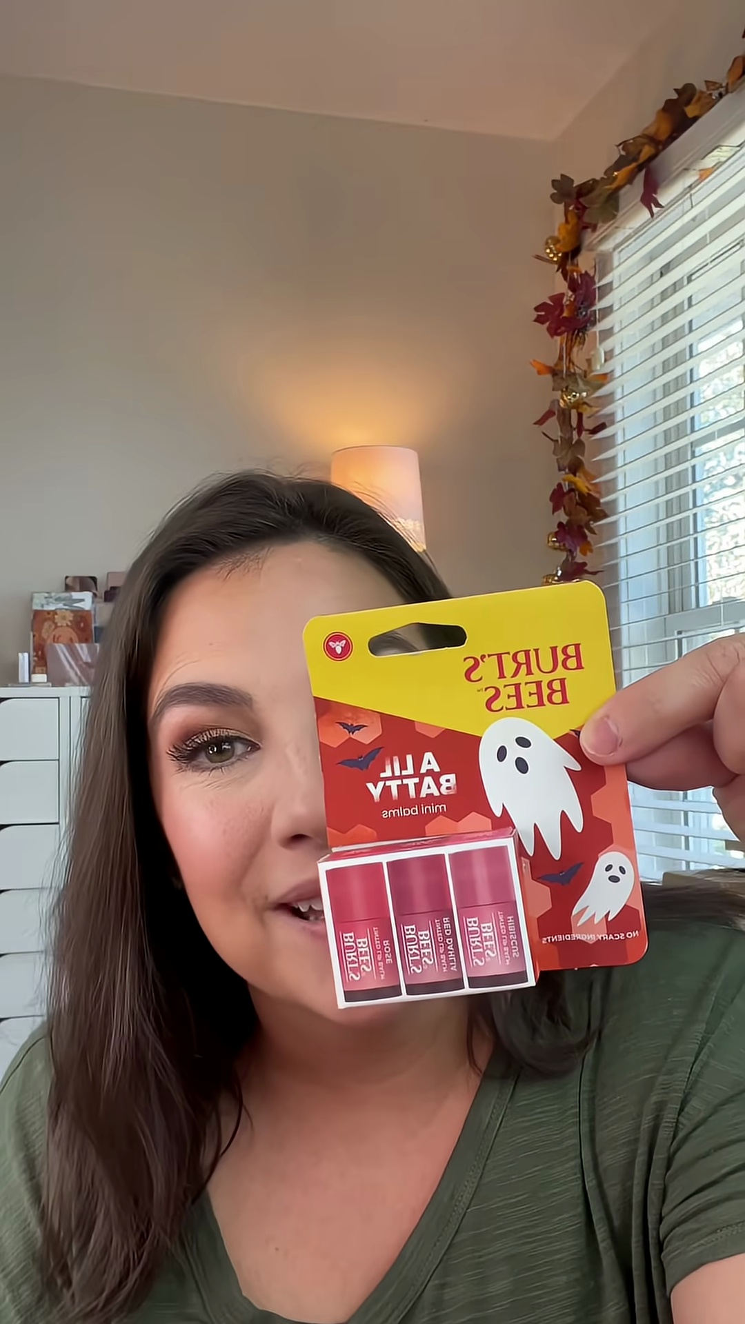 Three miniature bdy lip balms displayed together showing their tiny size