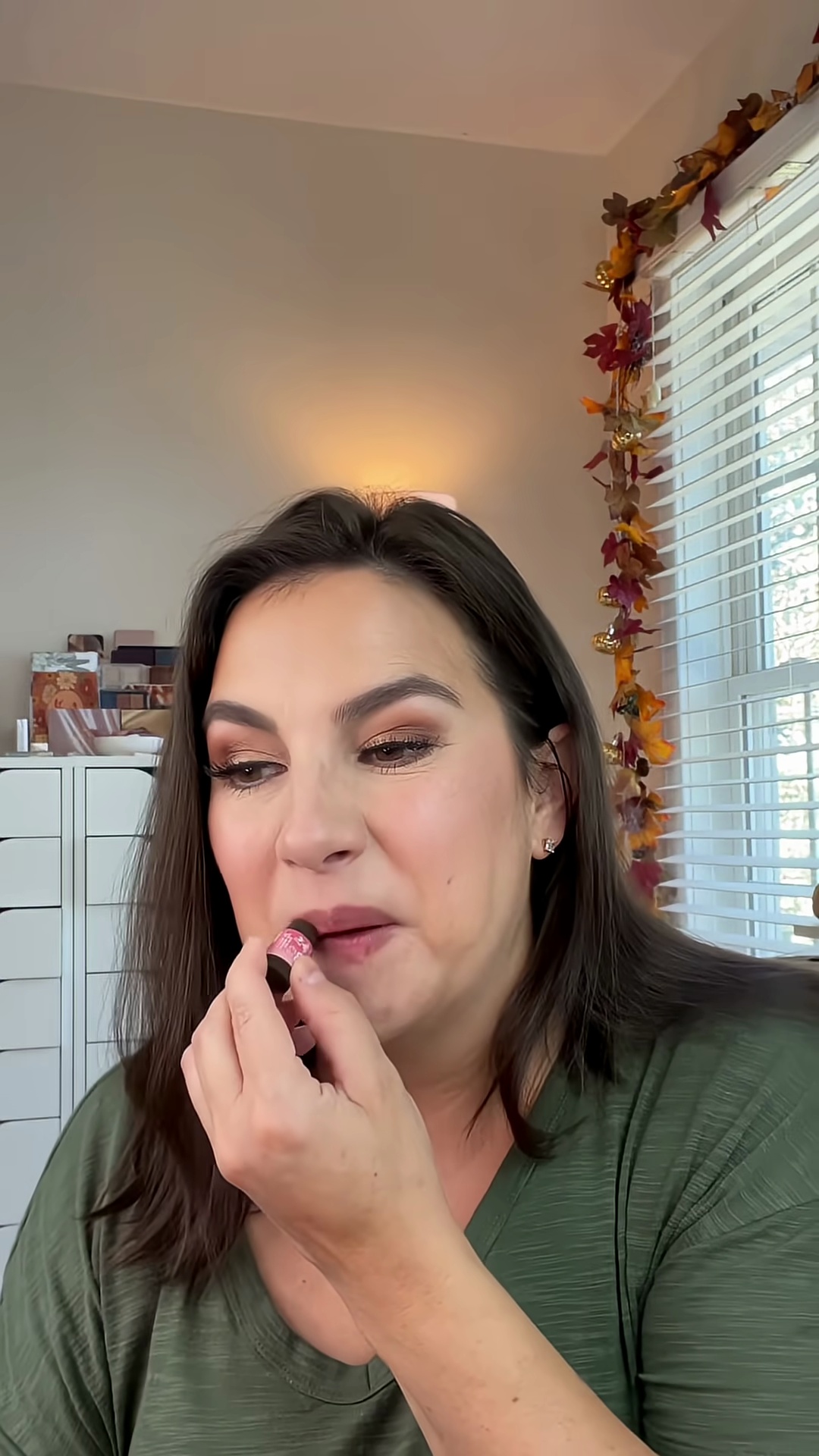 Close-up of the rose lip balm showing its soft red color