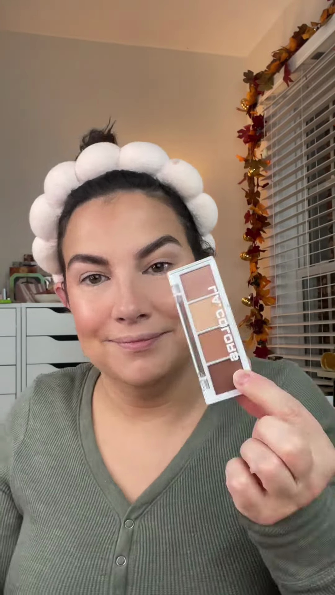 LA Colors eye quad palette showing four shades - three mattes and one shimmer