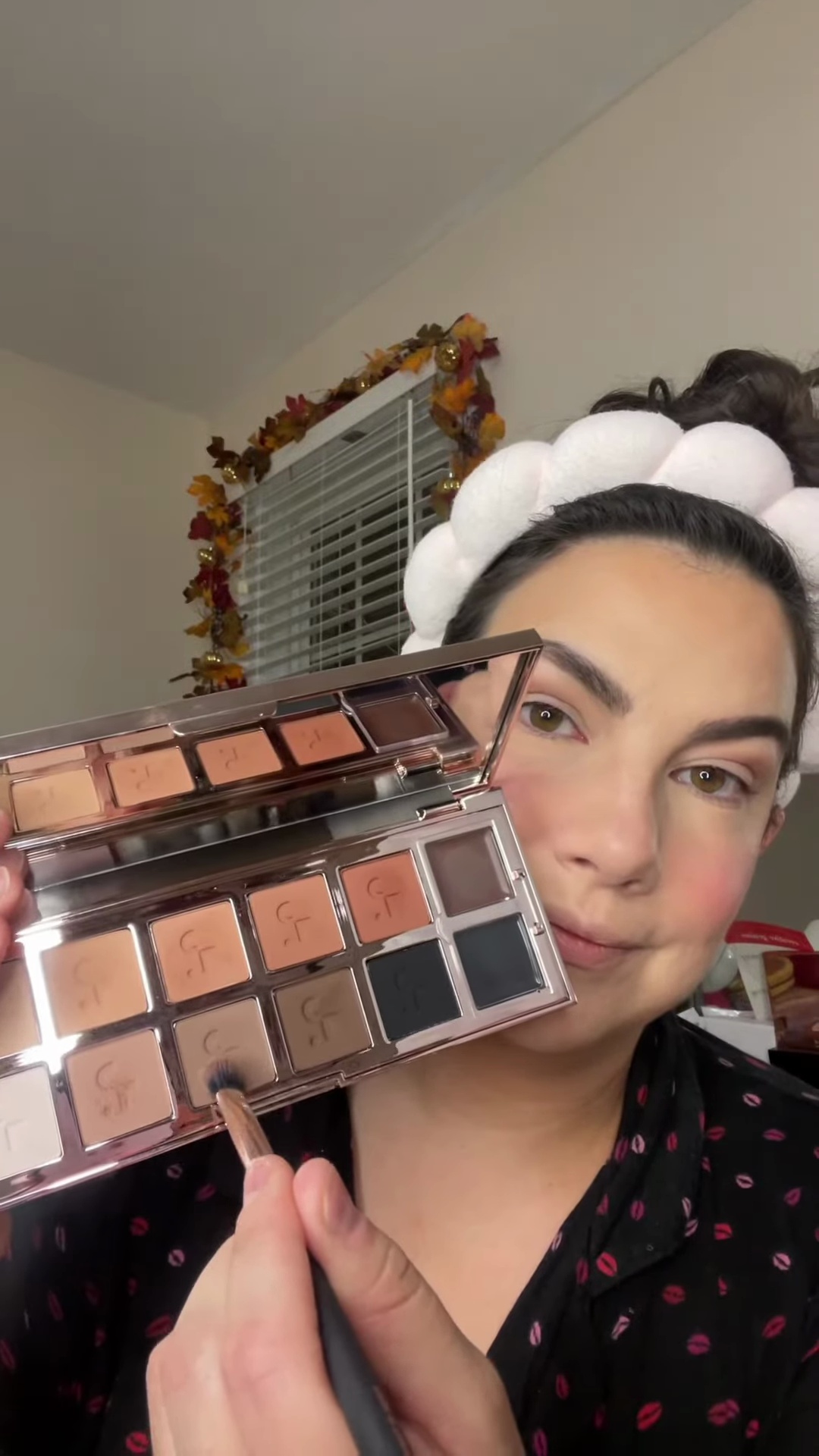 Emily applying matte highlighter shade under the brow bone