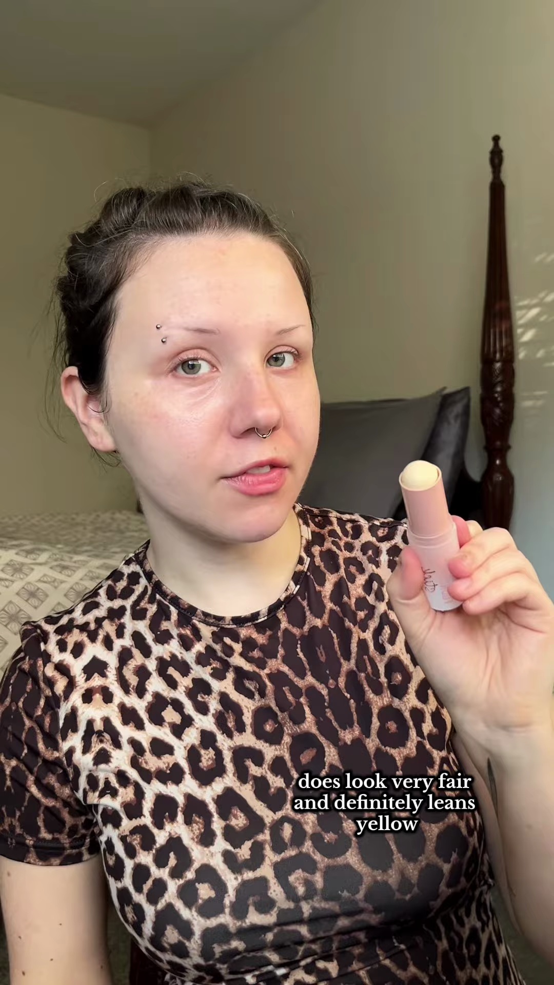 Close-up swatch of Essence foundation stick shade 03 blending seamlessly into pale olive skin