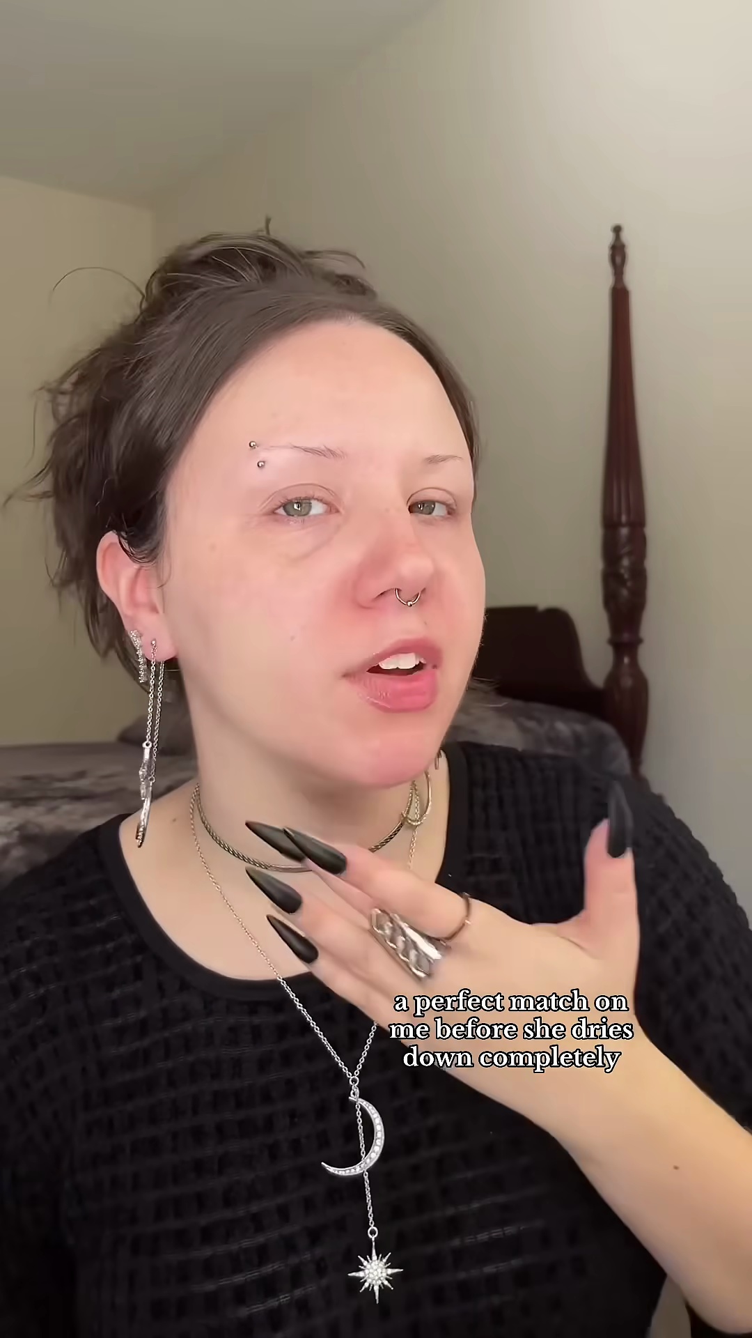 Foundation swatch on pale olive skin showing grayish green undertone