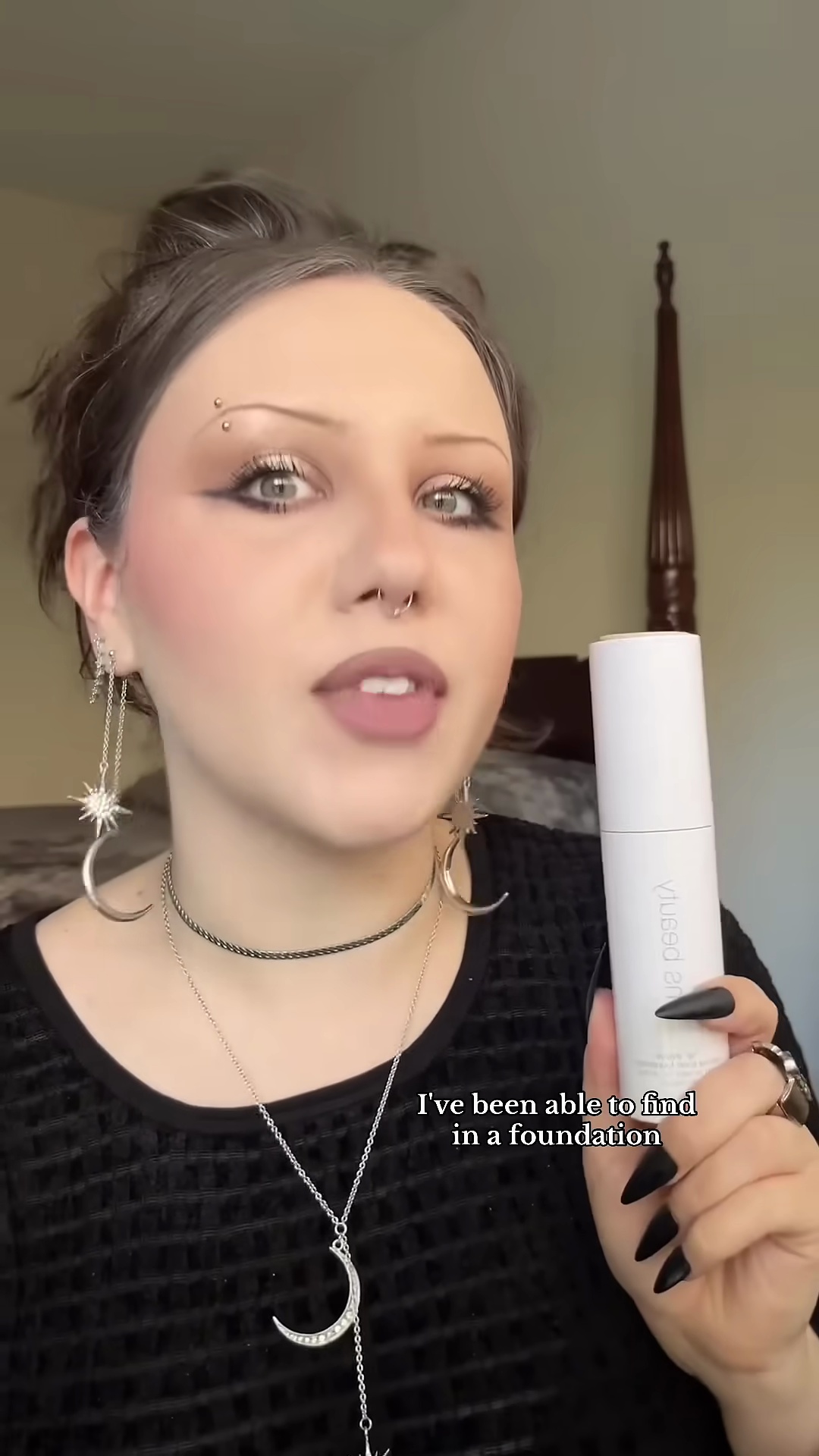 Finished makeup look with RMS Beauty foundation on pale olive skin