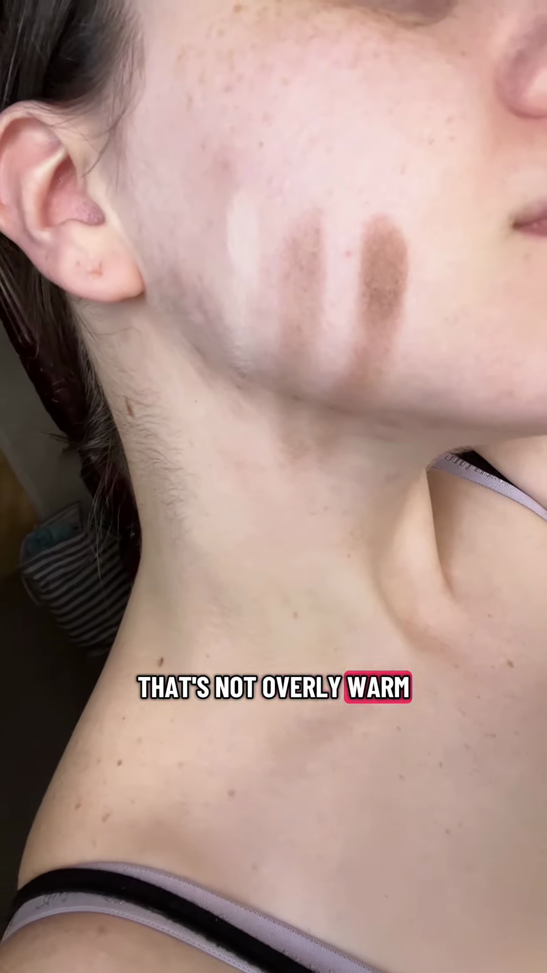 Bronzer shade swatched showing neutral tone suitable for fair olive skin