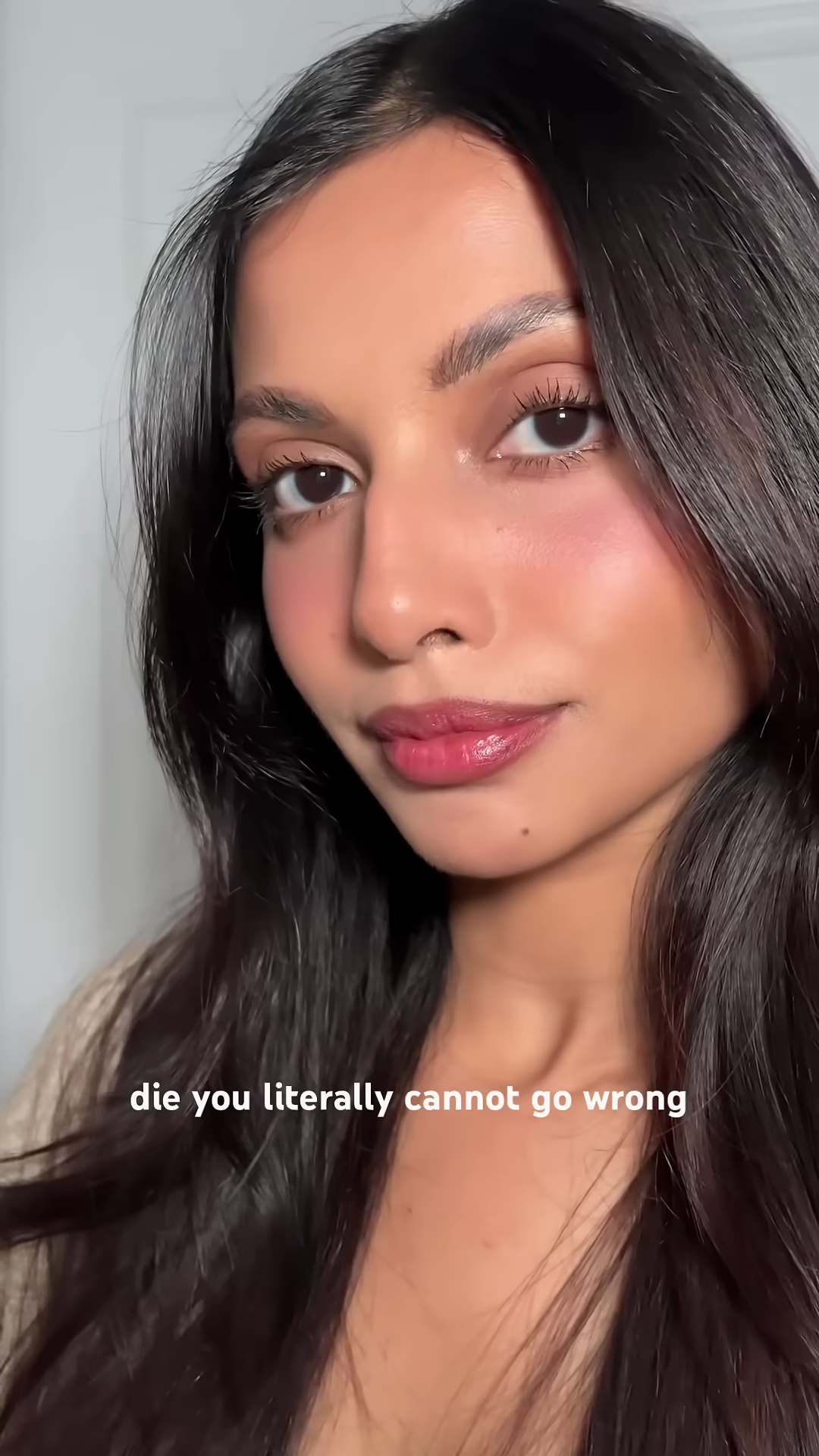 Creator smiling with the beautiful lip stain result